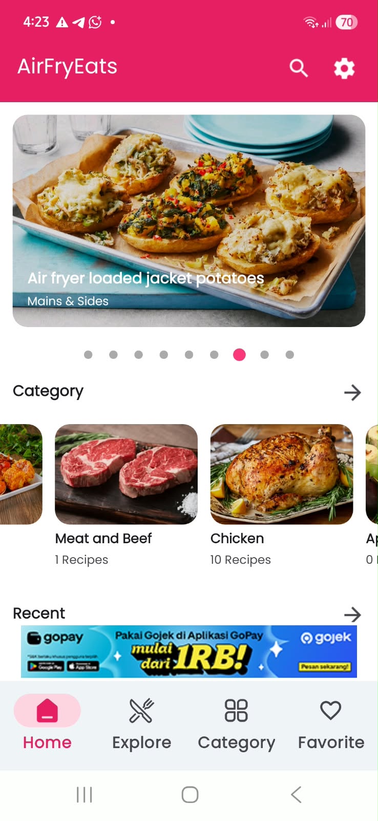 Actual Airfry Eats home screen showing a loaded jacket potatoes recipe, recipe categories, and bottom navigation
